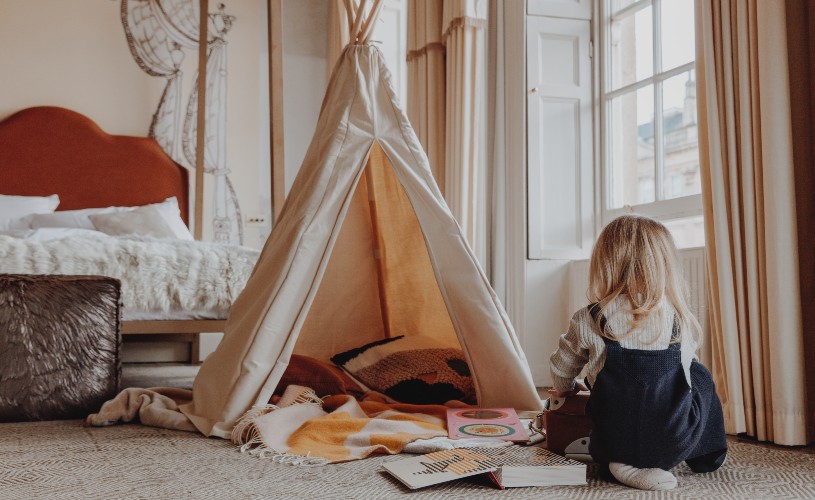 Child playing by mini tipi at No.15 by GuestHouse
